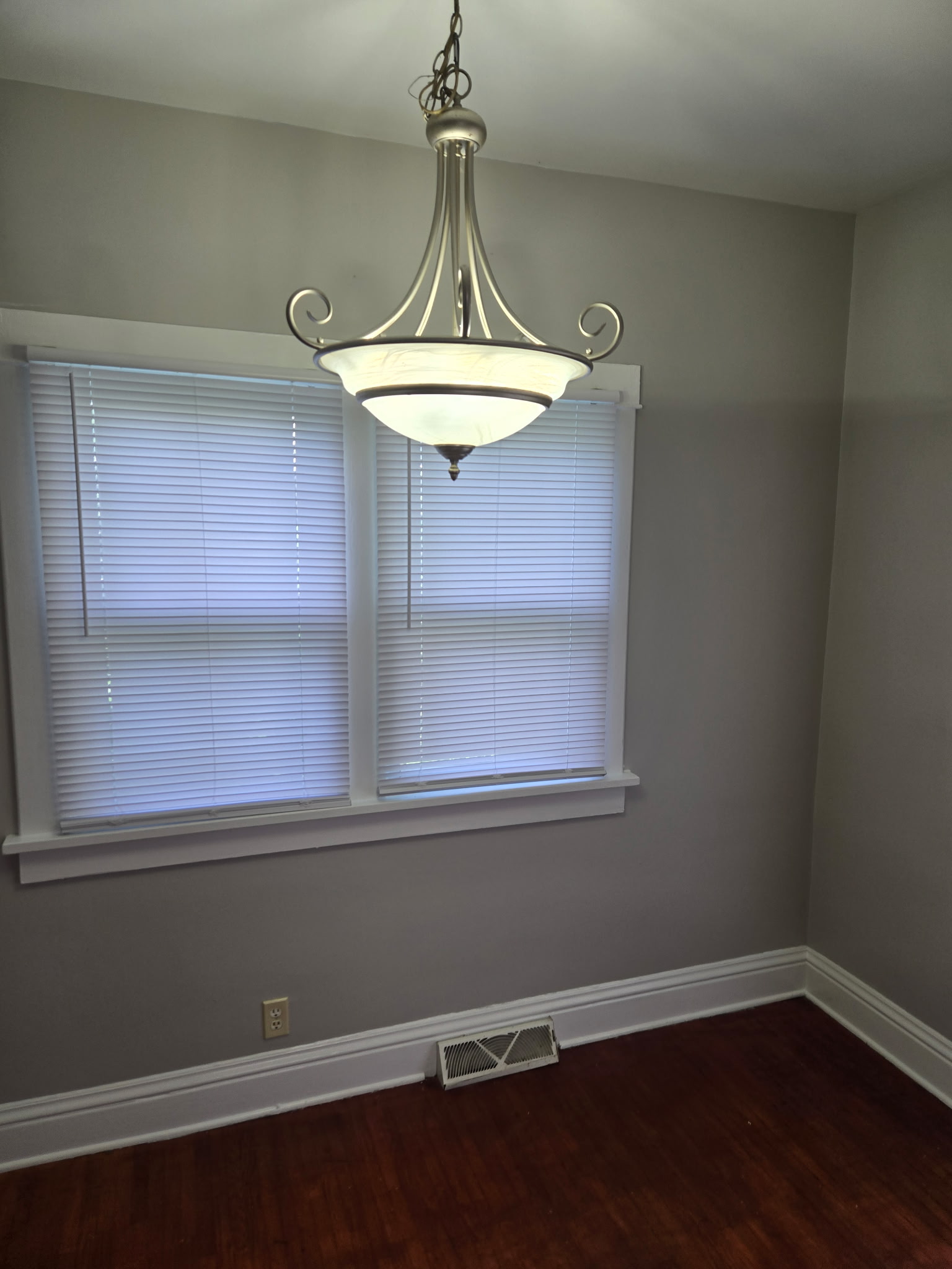 Interior painting - grey dining room with elegant chandelier